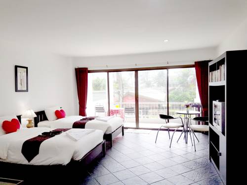Imagen de la habitación del Hotel Dengs Kamala Resort. Foto 14