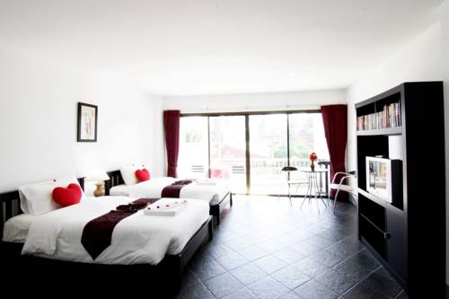 Imagen de la habitación del Hotel Dengs Kamala Resort. Foto 16