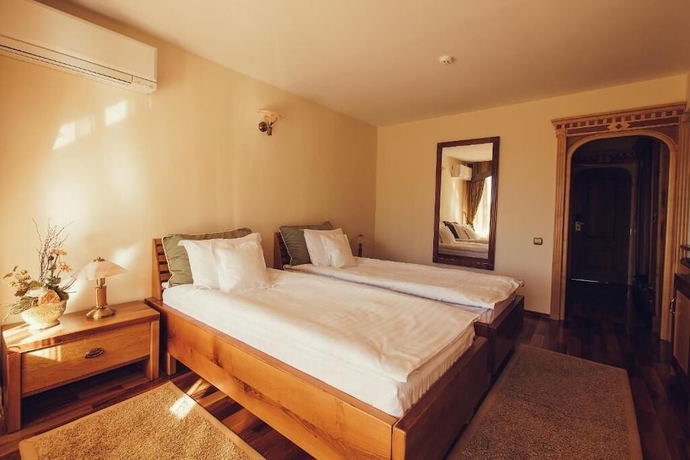 Imagen de la habitación del Hotel Denisa Boutique. Foto 7