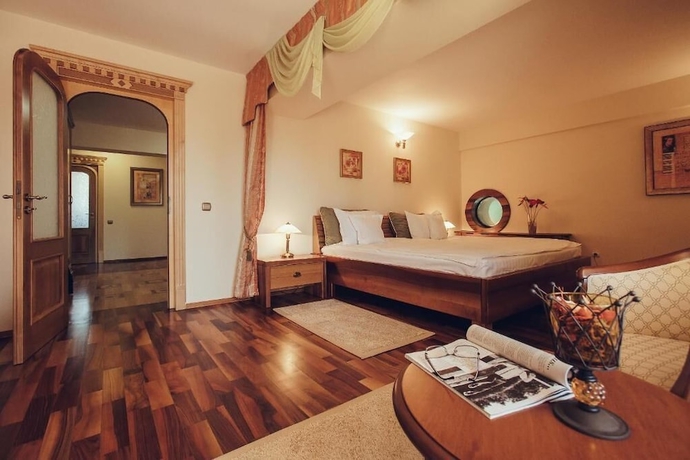Imagen de la habitación del Hotel Denisa Boutique. Foto 10