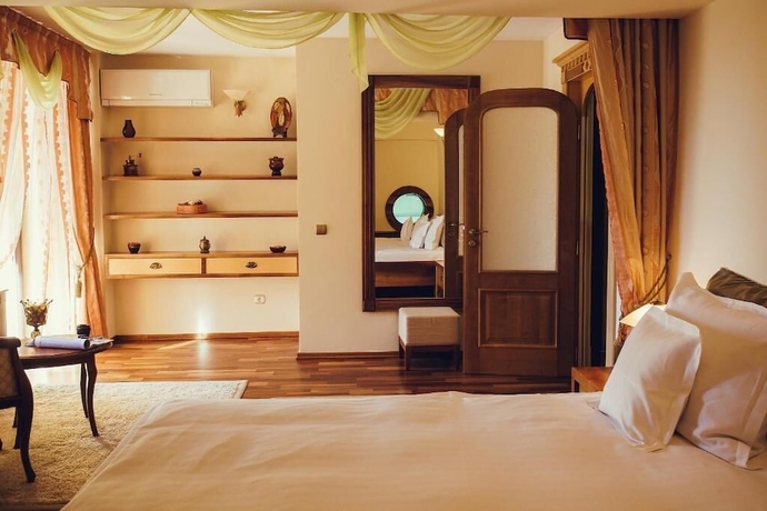 Imagen de la habitación del Hotel Denisa Boutique. Foto 13