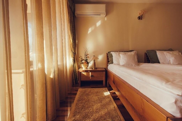 Imagen de la habitación del Hotel Denisa Boutique. Foto 14