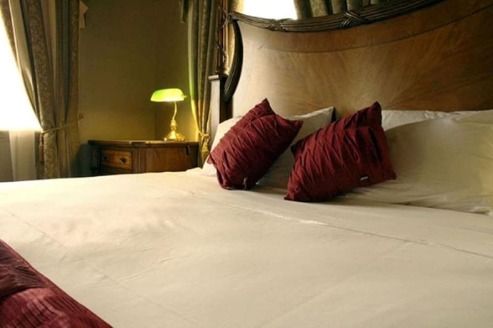 Imagen de la habitación del Hotel Denison Boutique. Foto 8