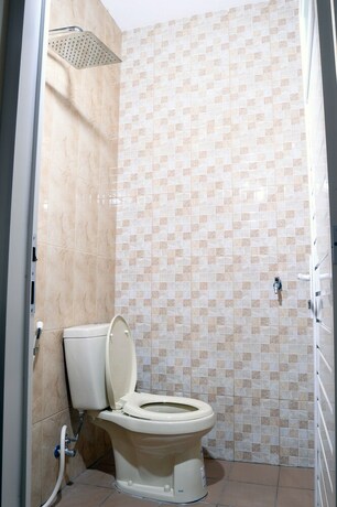 Imagen de la habitación del Hotel Denofe House. Foto 25