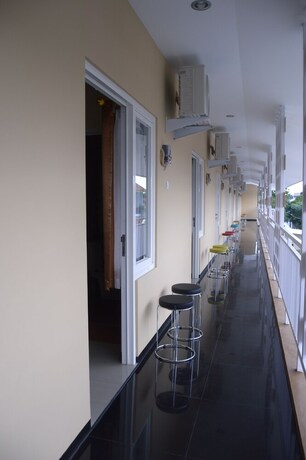 Imagen de la habitación del Hotel Denofe House. Foto 26