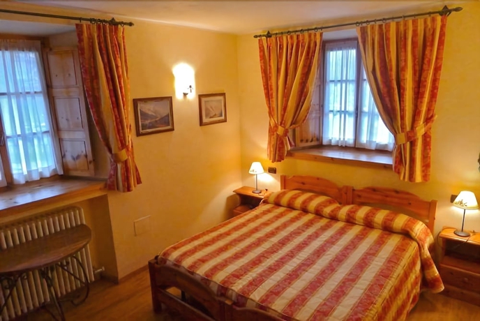 Imagen de la habitación del Hotel Dente Del Gigante. Foto 2