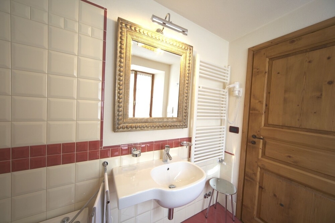 Imagen de la habitación del Hotel Dente Del Gigante. Foto 17