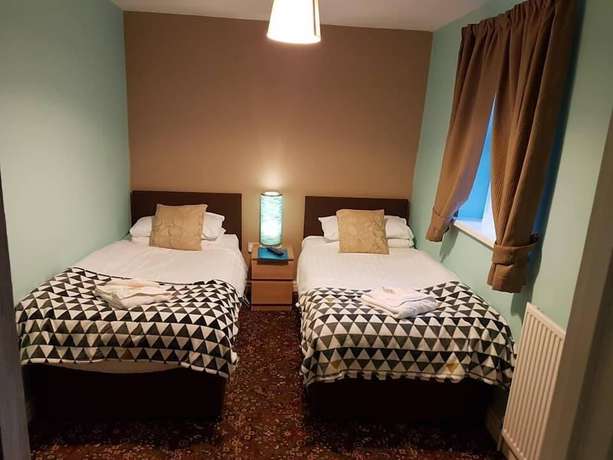 Imagen de la habitación del Hotel Denville. Foto 4