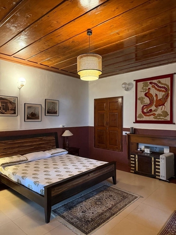 Imagen de la habitación del Hotel Deodar Manor - A Luxury Stay in Khajjiar. Foto 6