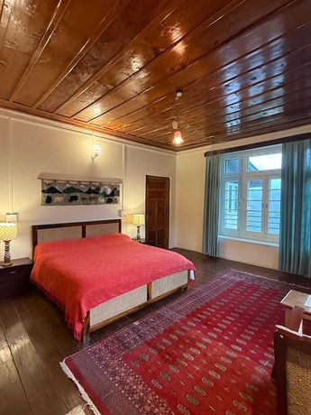 Imagen de la habitación del Hotel Deodar Manor - A Luxury Stay in Khajjiar. Foto 7