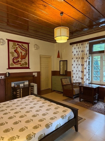 Imagen de la habitación del Hotel Deodar Manor - A Luxury Stay in Khajjiar. Foto 8
