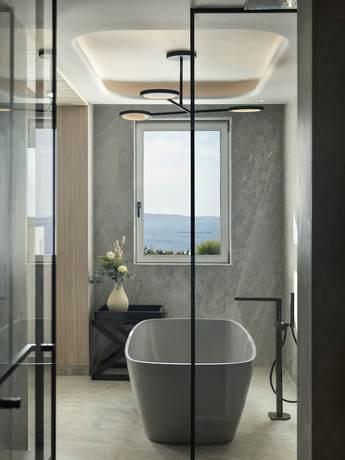 Imagen de la habitación del Hotel Deos Mykonos-A Myconian Collection hotel. Foto 5