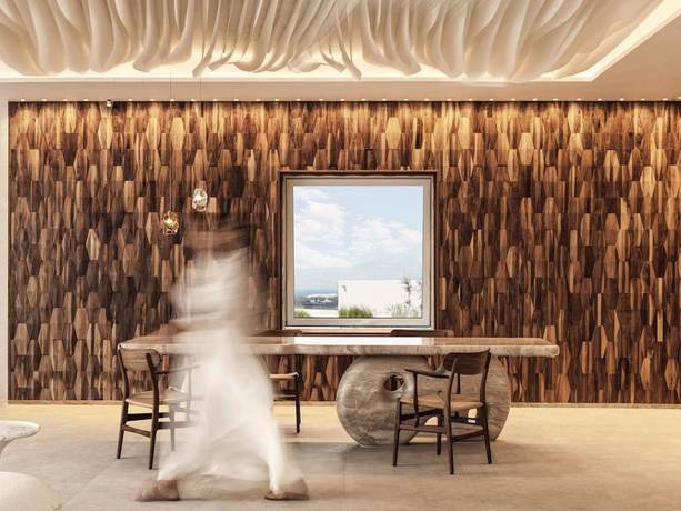 Imagen del bar/restaurante del Hotel Deos Mykonos-A Myconian Collection hotel. Foto 3