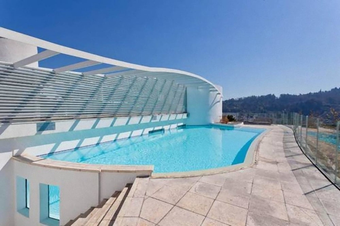 Imagen de la piscina del Hotel Departamentos Amoblados Costa Lyon. Foto 19