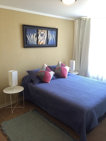 Imagen de la habitación del Hotel Departamentos Amoblados Don Teodoro. Foto 11