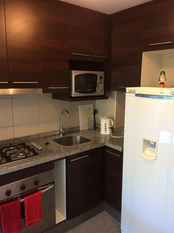 Imagen de la habitación del Hotel Departamentos Amoblados Don Teodoro. Foto 18