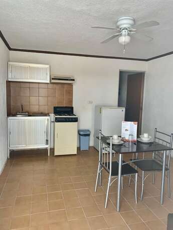 Imagen de la habitación del Hotel Departamentos Kuxtal Mid. Foto 11
