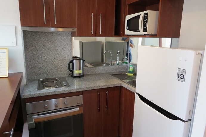 Imagen de la habitación del Hotel Departamentos Pontoni. Foto 9