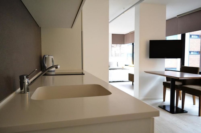 Imagen de la habitación del Hotel Departamentos Rondeau By Lugar. Foto 3