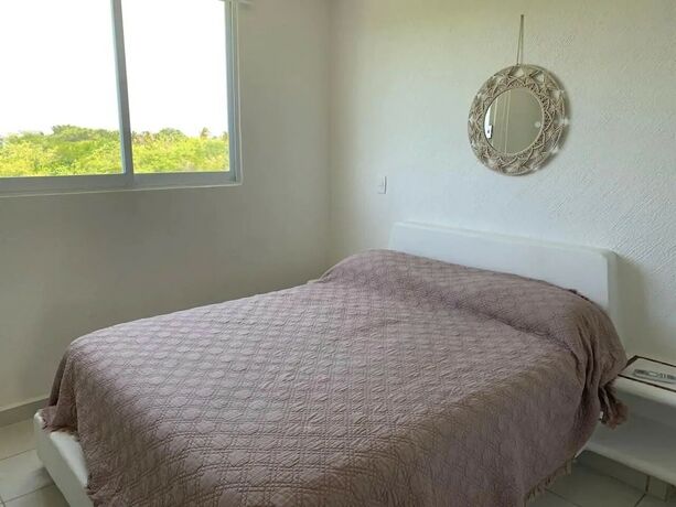 Imagen de la habitación del Hotel Departamentos TT2. Foto 12