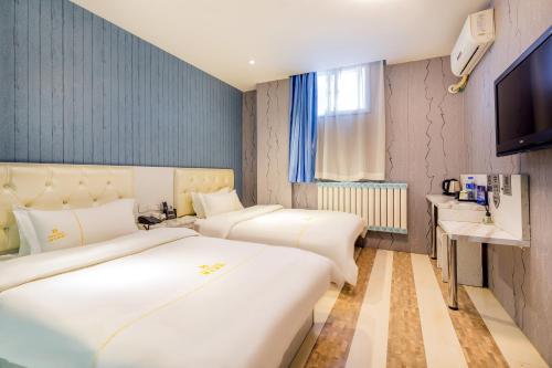 Imagen general del Hotel 德全酒店 Dequan Beijing Chaoyang Park Jintai Road Subway Station Branch. Foto 1