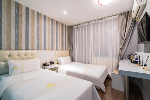 Imagen general del Hotel 德全酒店 Dequan Beijing Chaoyang Park Jintai Road Subway Station Branch. Foto 2