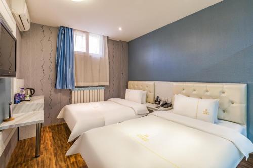 Imagen de la habitación del Hotel 德全酒店 Dequan Beijing Chaoyang Park Jintai Road Subway Station Branch. Foto 18