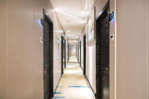 Imagen general del Hotel 德全酒店 Dequan Beijing Chaoyang Park Jintai Road Subway Station Branch. Foto 8