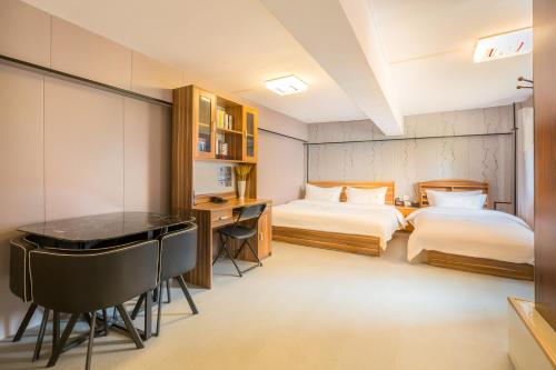 Imagen de la habitación del Hotel 德全酒店 Dequan Beijing Chaoyang Park Jintai Road Subway Station Branch. Foto 20