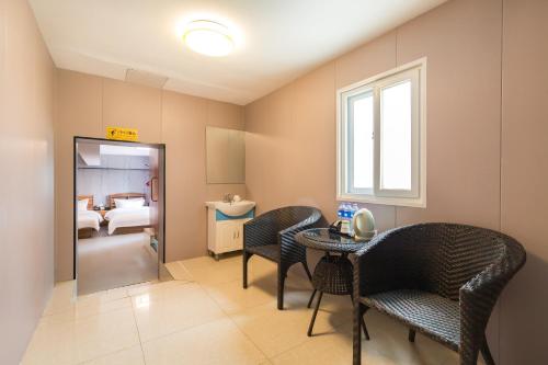 Imagen general del Hotel 德全酒店 Dequan Beijing Chaoyang Park Jintai Road Subway Station Branch. Foto 16