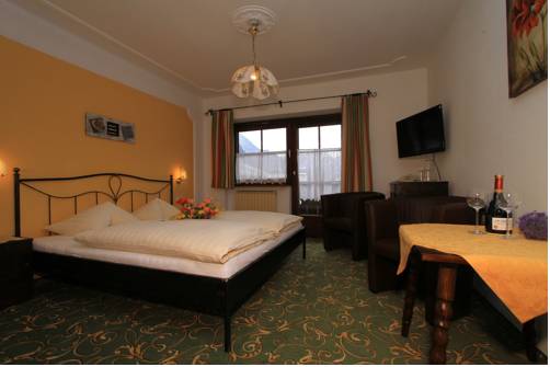 Imagen de la habitación del Hotel Der Br&auml;uschmied, Lofer. Foto 11