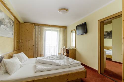 Imagen de la habitación del Hotel Der Dolomitenhof - Tristach. Foto 10