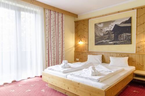 Imagen de la habitación del Hotel Der Dolomitenhof - Tristach. Foto 11