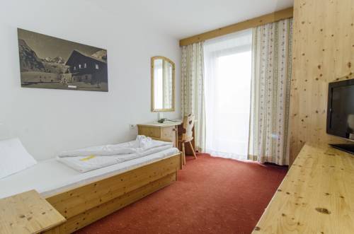 Imagen de la habitación del Hotel Der Dolomitenhof - Tristach. Foto 13