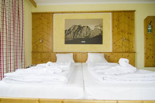 Imagen de la habitación del Hotel Der Dolomitenhof - Tristach. Foto 15
