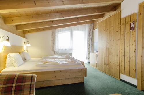 Imagen de la habitación del Hotel Der Dolomitenhof - Tristach. Foto 16