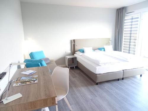 Imagen de la habitación del Hotel Der Florenberg - Gipfel F&uuml;r Genie&szlig;er. Foto 10