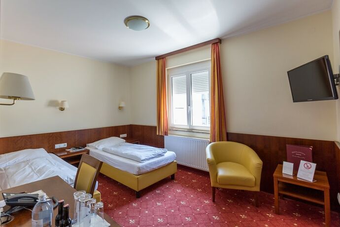 Imagen de la habitación del Hotel Der Kaiserhof. Foto 16