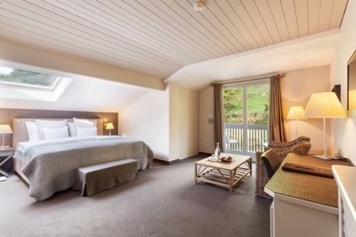 Imagen de la habitación del Hotel Der K&uuml;glerhof, Merano. Foto 2