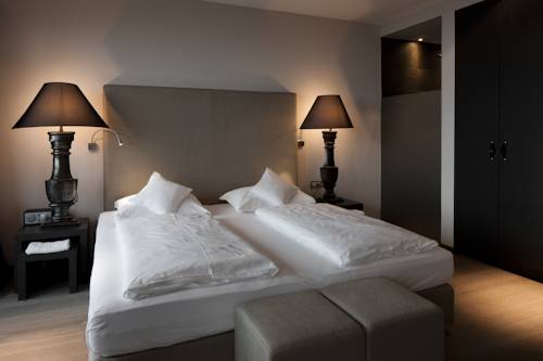 Imagen de la habitación del Hotel Der K&uuml;glerhof, Merano. Foto 6