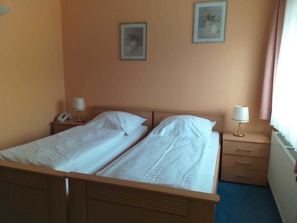 Imagen de la habitación del Hotel Der Quellenhof. Foto 6