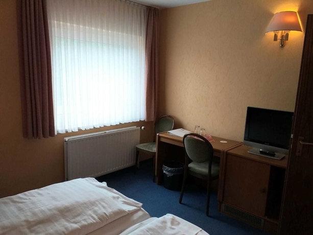 Imagen de la habitación del Hotel Der Quellenhof. Foto 7