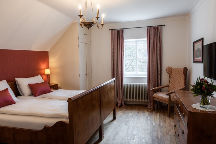 Imagen de la habitación del Hotel Der Schlosswirt Zu Anif - Biedermeier-hotel Und Restaurant. Foto 13