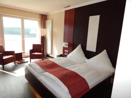 Imagen de la habitación del Hotel Der Seehof, Hasenfeld. Foto 7