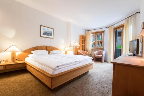 Imagen de la habitación del Hotel Der Waldhof, V&ouml;llan - Foiana. Foto 10