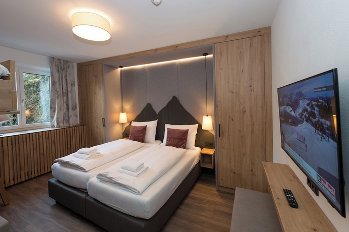 Imagen de la habitación del Hotel Der Zirmhof in Saalbach. Foto 4