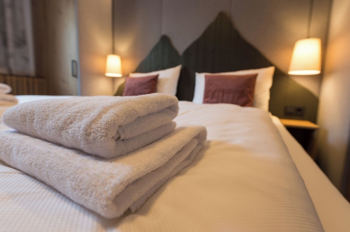 Imagen de la habitación del Hotel Der Zirmhof in Saalbach. Foto 6