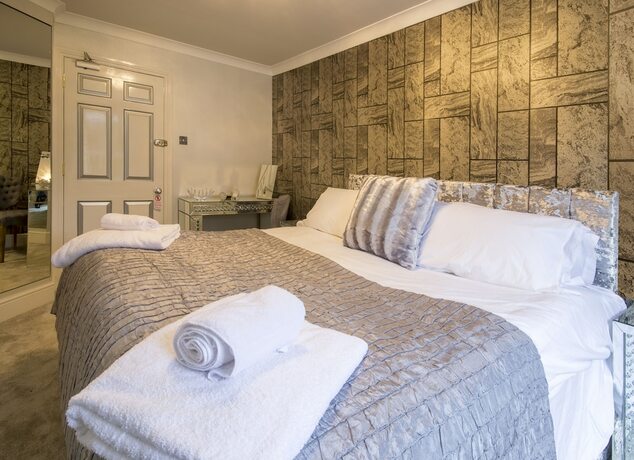 Imagen de la habitación del Hotel Derby Manor. Foto 17