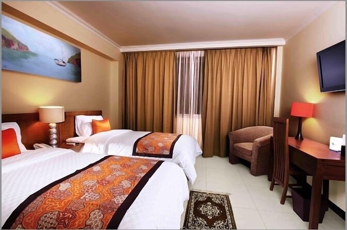 Imagen de la habitación del Hotel Dermaga Keluarga. Foto 7