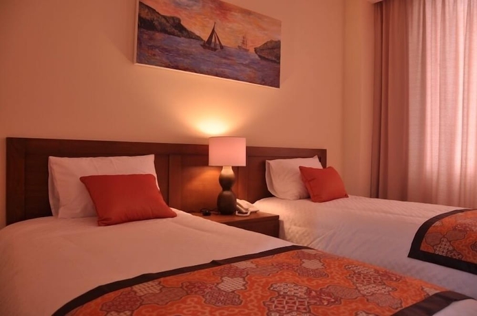 Imagen de la habitación del Hotel Dermaga Keluarga. Foto 11
